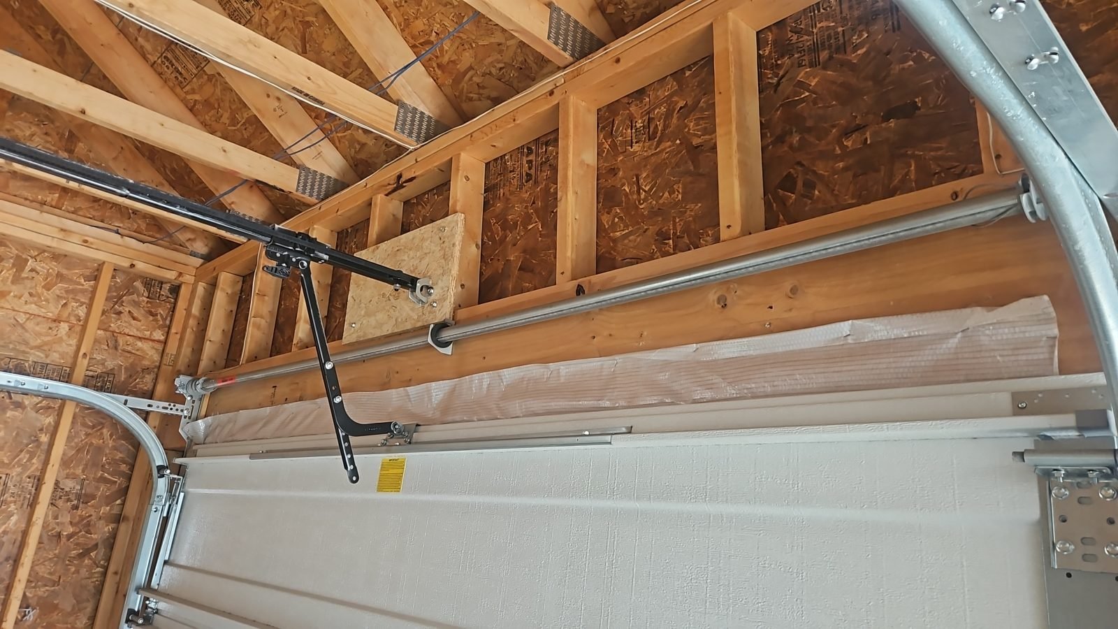 Garage door spring replacement by Heritage Garage Doors in Massachusetts