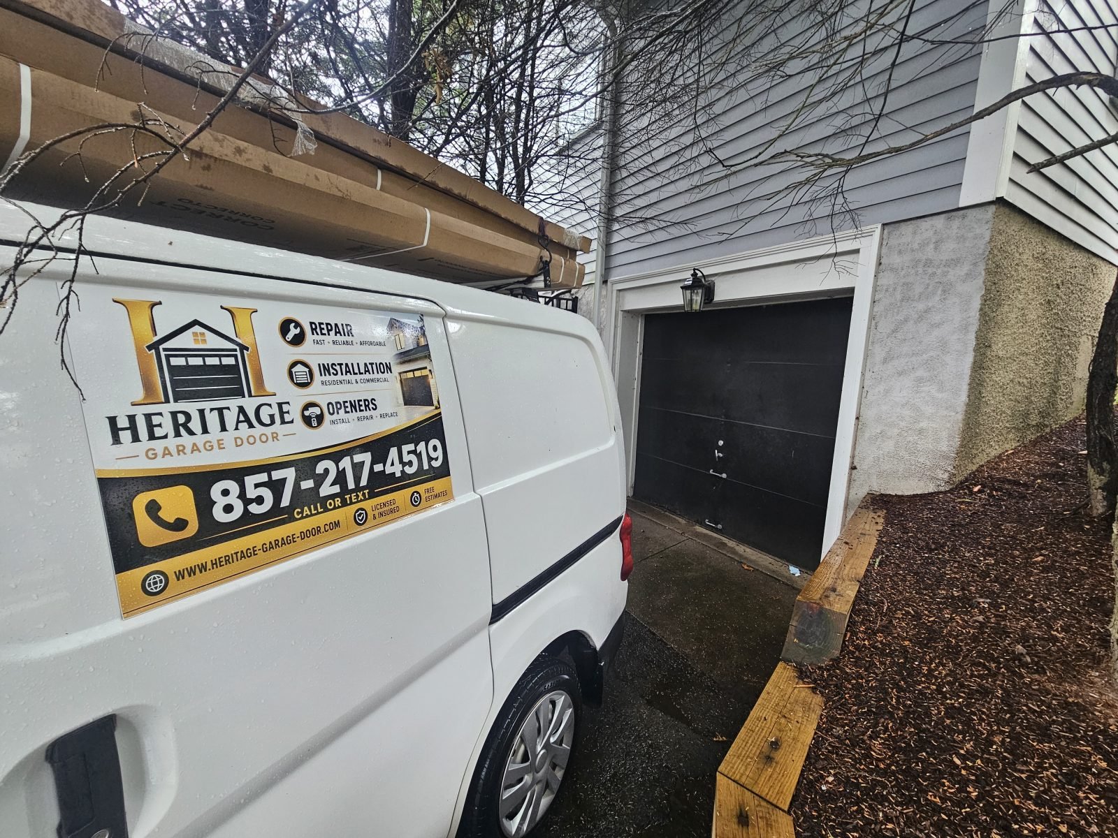 Garage door before replacement, door removed ahead of new installation