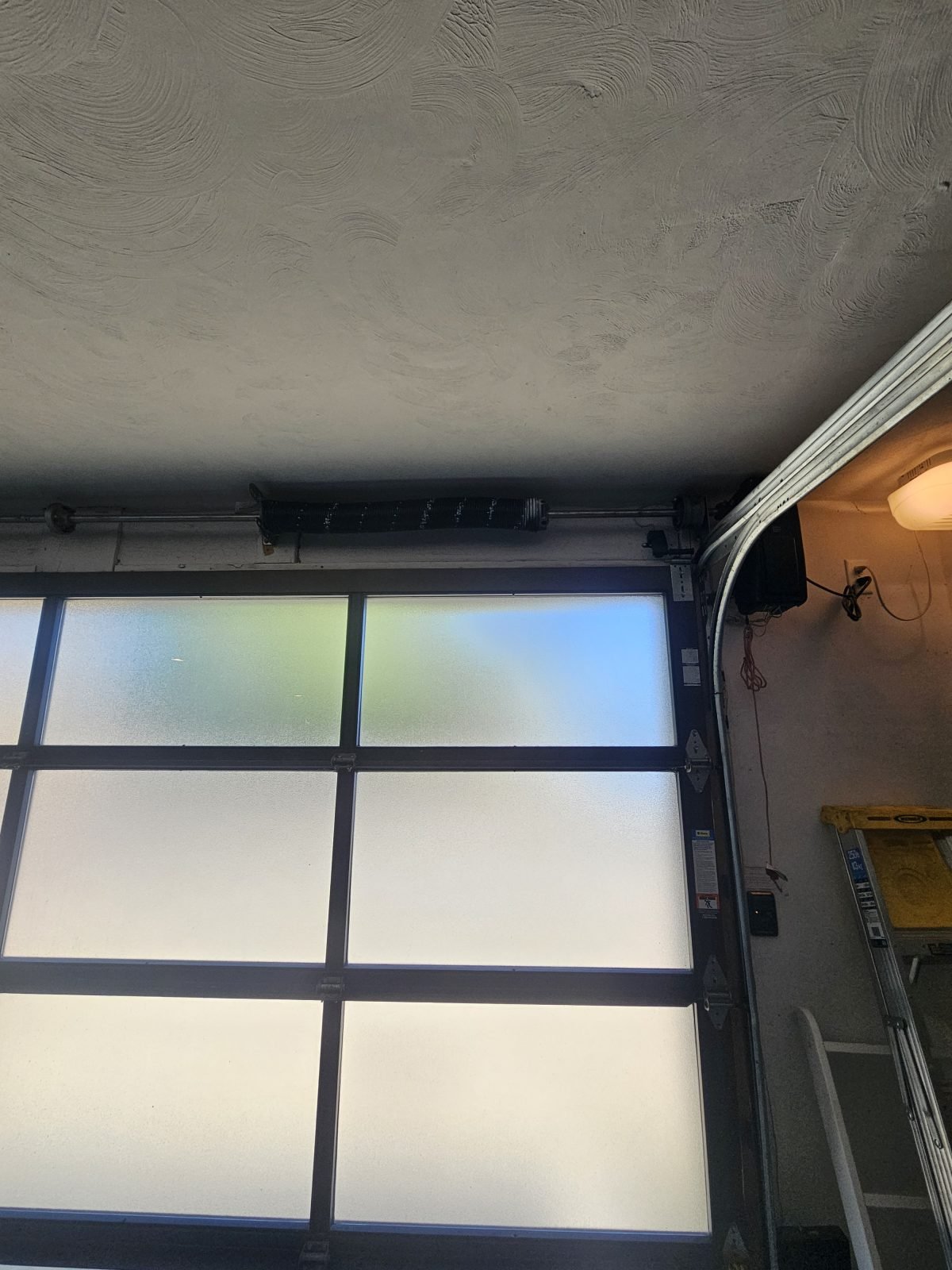New torsion springs installed on glass garage door in Charlestown, MA