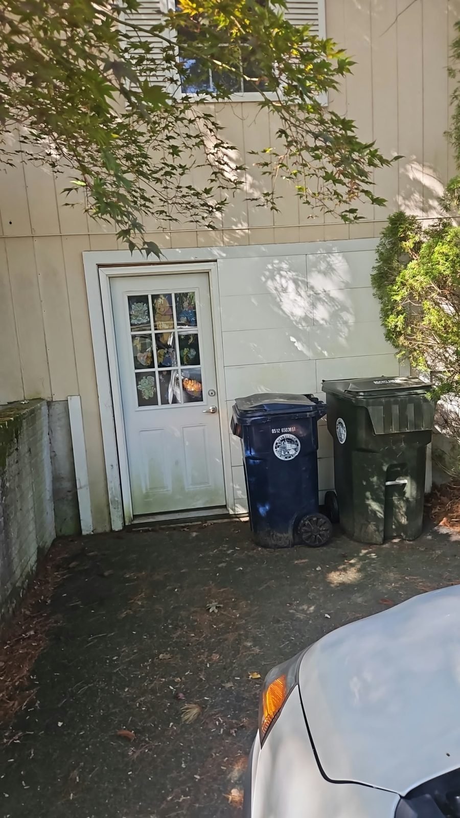 Old garage door before replacement in Marlborough, MA
