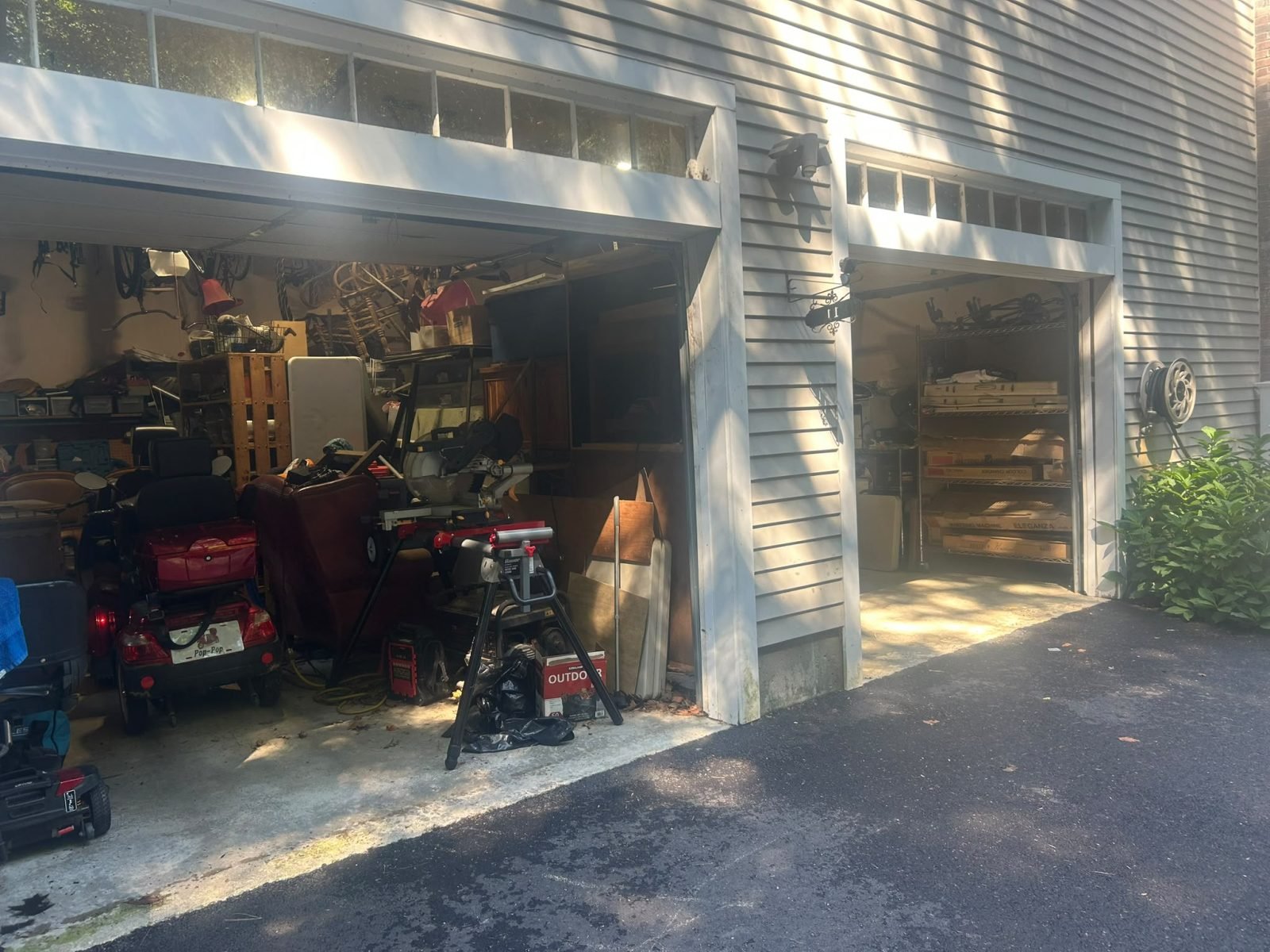 Garage door opening before replacement, door removed ahead of new installation